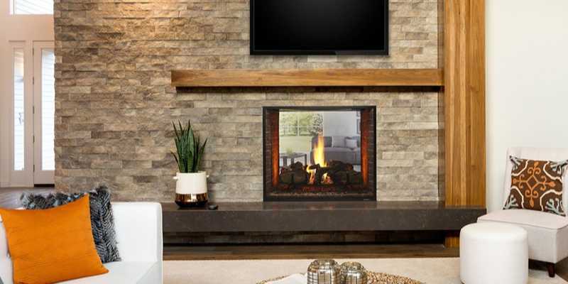 Heat&Glo Escape See-through Gas Fireplace I, in home's living room.