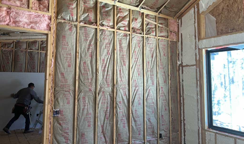 fiberglass-insulation Fiberglass Insulation in an open wall